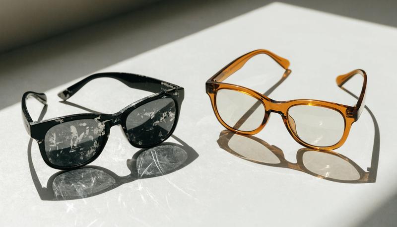 Worn sunglasses showing lens wear over time