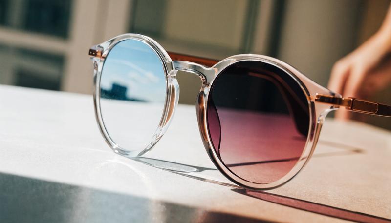Photochromic sunglasses lens tinting in sunlight