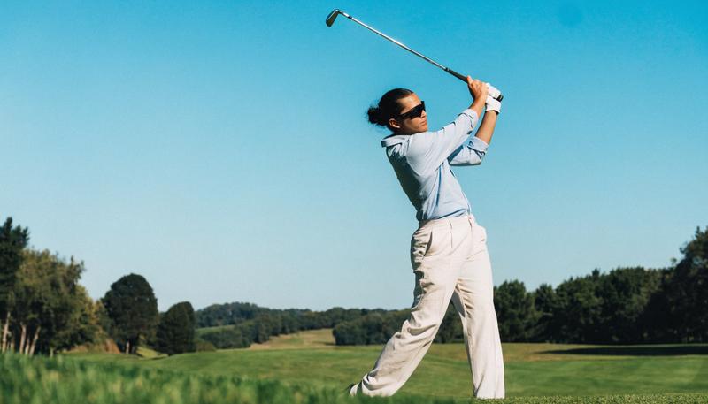 Golfer wearing sport sunglasses